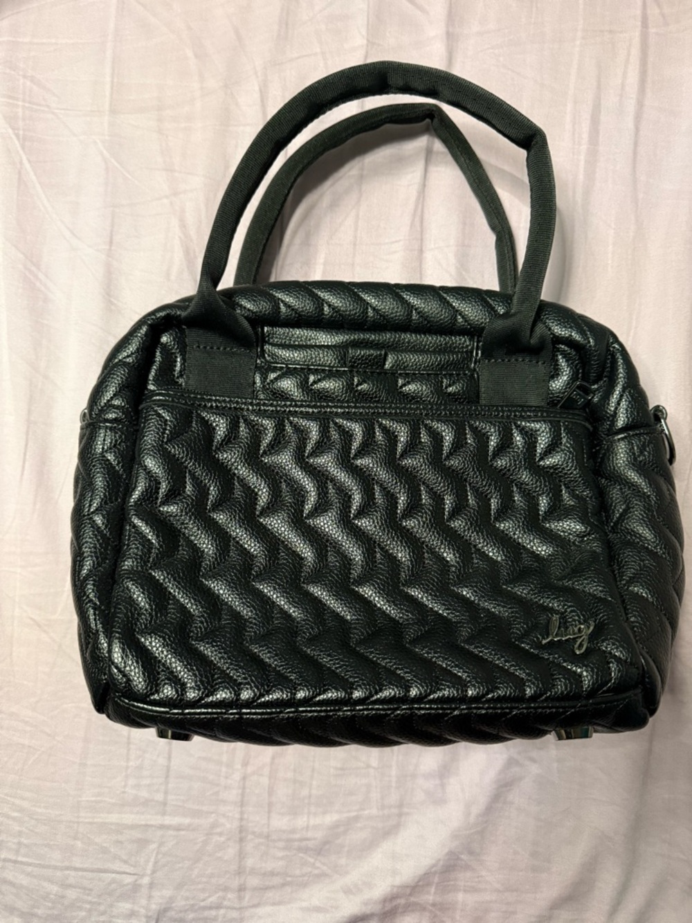 Lug Jive vegan leather, comes with two crossbody strap choices.